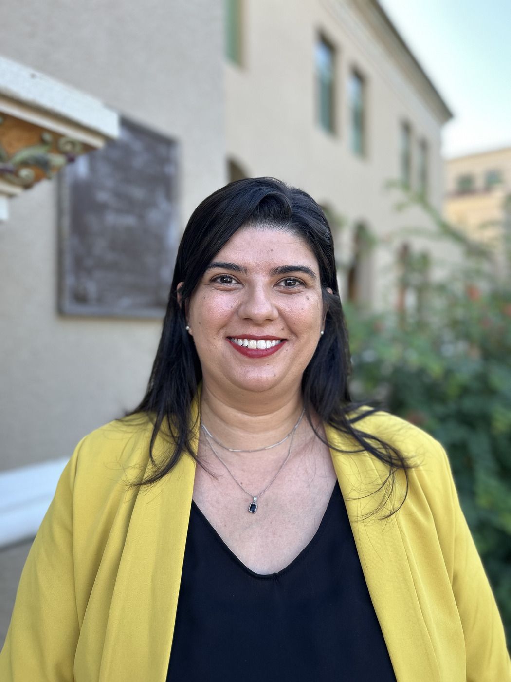 Headshot of Cláudia De Souza